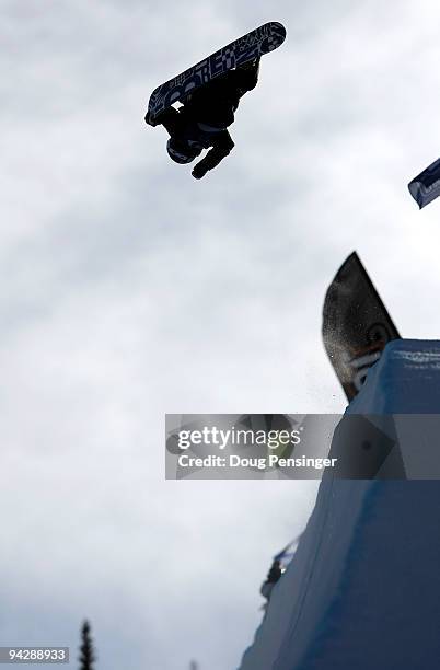 Shaun White of the USA spins above the pipe as he takes his first run in the US Snowboarding Grand Prix Men's Qualifier on the Main Vein Half Pipe on...