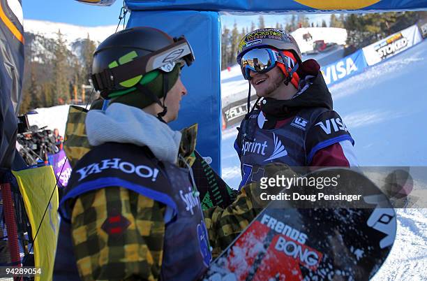 Jack Mitrani of the USA and Scott Lago of the USA talk after their first run in the US Snowboarding Grand Prix Men's Qualifier on the Main Vein Half...