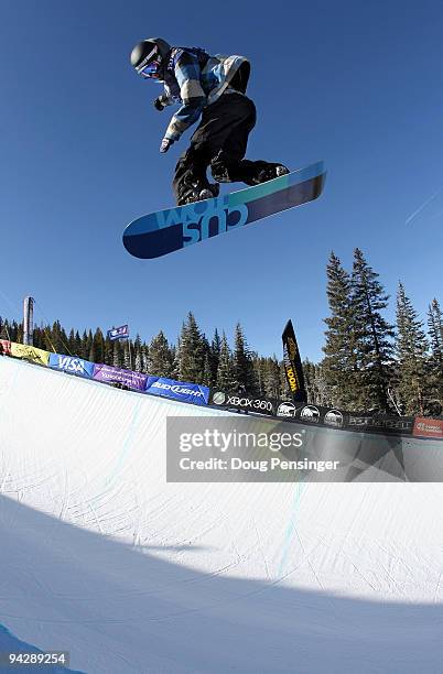 Mason Aguirre of the USA spins an aerial above the pipe during the US Snowboarding Grand Prix Men's Qualifier on the Main Vein Half Pipe on December...