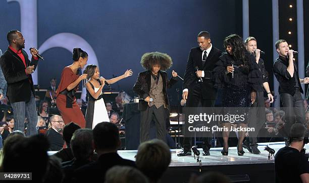 Wyclef Jean, Donna Summer, Will Smith, Jada Pinkett Smith and Jaden Smith and Willow Smith sing on stage during the Nobel Peace Prize Concert at Oslo...