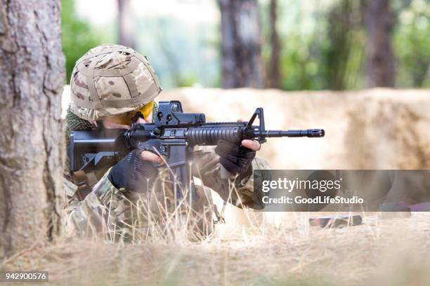 soldier in a trench - uk army stock pictures, royalty-free photos & images