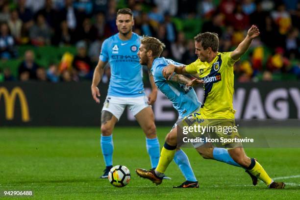 Wout Brama of the Central Coast Mariners and Luke Brattan of Melbourne City contest the ball during Round 26 of the Hyundai A-League Series between...