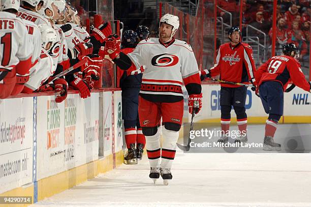 Aaron Ward of the Carolina Hurricanes celebrates a goal during a NHL hockey game against the Washington Capitals on December 11, 2009 at the Verizon...