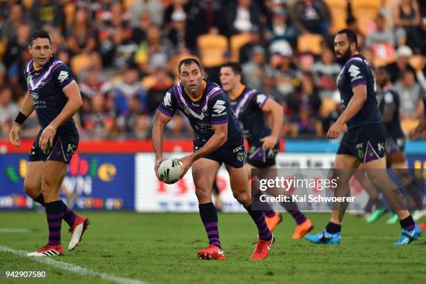 Cameron Smith of the Storm looks to pass the ball during the round five NRL match between the Wests Tigers and the Melbourne Storm at Mt Smart...