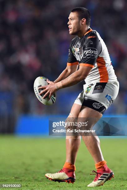 Tuimoala Lolohea of the Tigers looks to pass the ball during the round five NRL match between the Wests Tigers and the Melbourne Storm at Mt Smart...