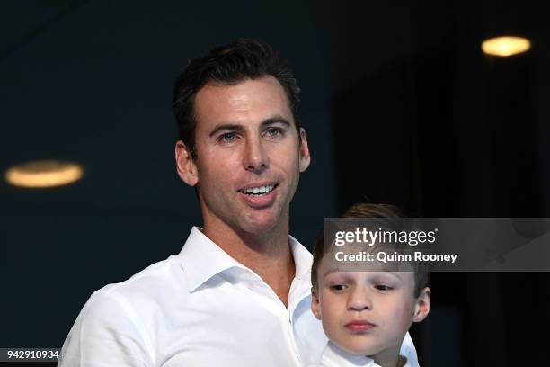 Grant Hackett and son Jagger Emilio Hackett look on during day three of the Gold Coast 2018 Commonwealth Games at Optus Aquatic Centre on April 7,...