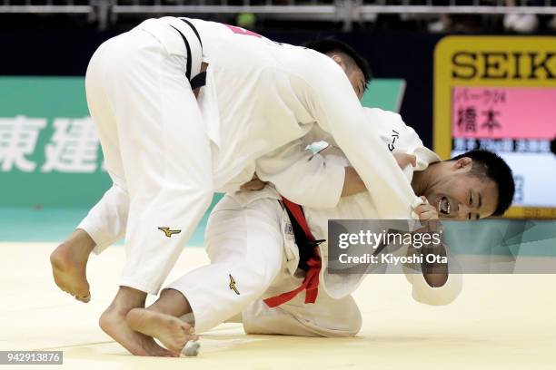 Soichi Hashimoto attempts to throw Masashi Ebinuma in the Men's -73kg final match on day one of the All Japan Judo Championships by Weight Category...