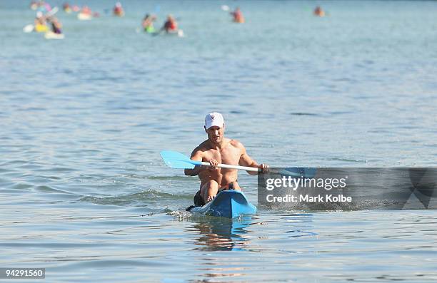 Jude Bolton paddles to shore during a Sydney Swans pre-season kayaking fitness session on Sydney Harbour at Rose Bay on December 12, 2009 in Sydney,...