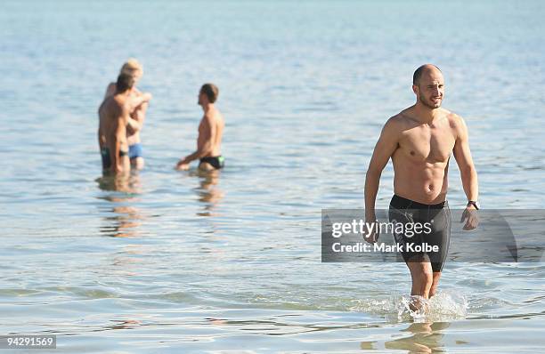 Tadhg Kennelly walks to shore during a Sydney Swans pre-season fitness session on Sydney Harbour at Rose Bay on December 12, 2009 in Sydney,...