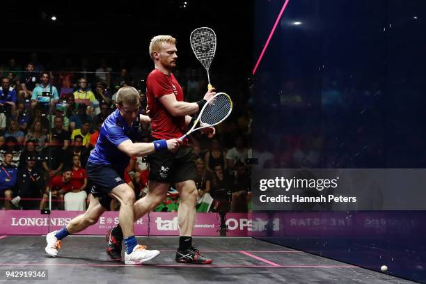 Joel Makin of Wales blocks Alan Clyne of Scotland during the Men's Singles Quarter Final match on day three of the Gold Coast 2018 Commonwealth Games...