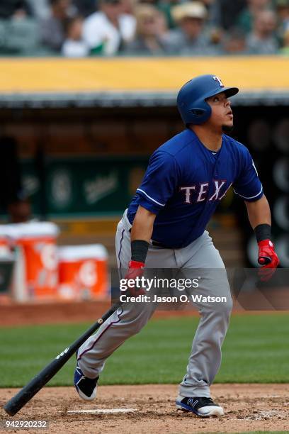 Juan Centeno of the Texas Rangers at bat against the Oakland Athletics during the fifth inning at the Oakland Coliseum on April 5, 2018 in Oakland,...