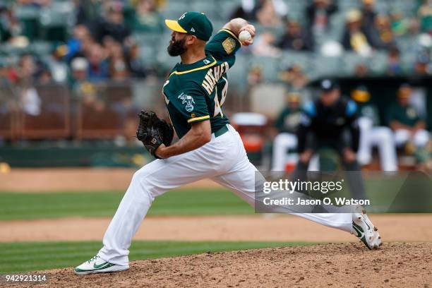 Chris Hatcher of the Oakland Athletics pitches against the Texas Rangers during the ninth inning at the Oakland Coliseum on April 5, 2018 in Oakland,...