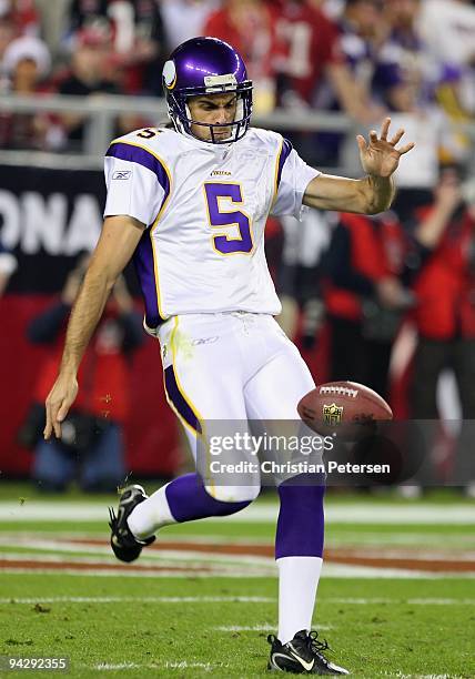 Punter Chris Kluwe of the Minnesota Vikings kicks the ball during the NFL game against the Arizona Cardinals at the Universtity of Phoenix Stadium on...