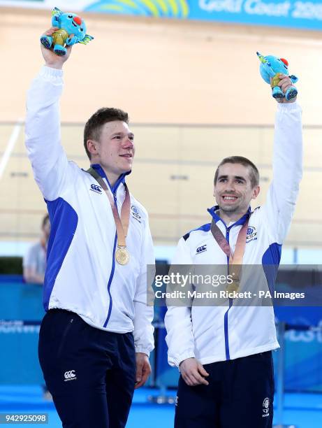 Scotland's Neil Fachie and pilot Matt Rotherham celebrate with their gold medals after the Men's B&VI Sprint Final at the Anna Meares Velodrome...