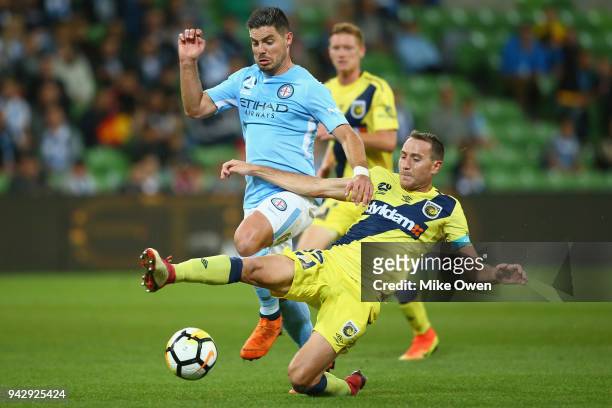 Bruno Fornaroli of Melbourne City and Alan Baro Calabuig of the Mariners compete for the ball during the round 26 A-League match between Melbourne...
