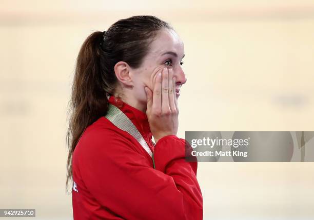 Gold medalist Elinor Barker of Wales shows her emotions during the medal ceremony for the Women's 25km Points Race Finalson day three of the Gold...