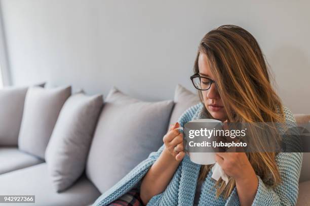 why am i sick and everyone else is fine - sipping broth stock pictures, royalty-free photos & images
