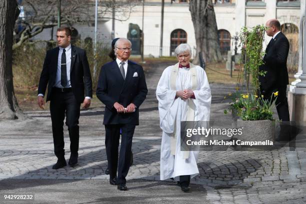 Carl XVI Gustaf of Sweden and Archbishop Antje Jackelen attend a tribute to victims of Stockholm terrorist attack on the first anniversary on April...