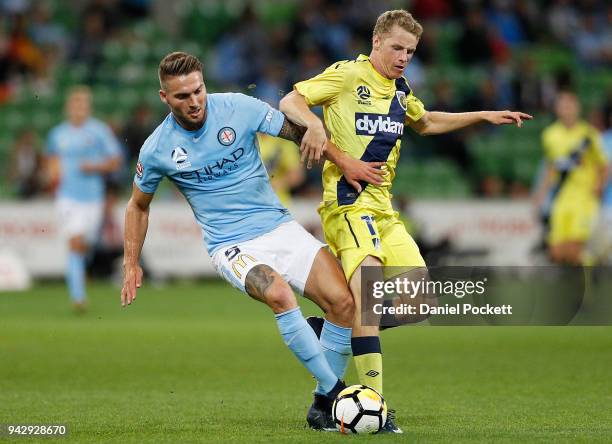 Bart Schenkeveld of Melbourne City and Trent Buhagiar of Central Coast Mariners contest the ball during the round 26 A-League match between Melbourne...