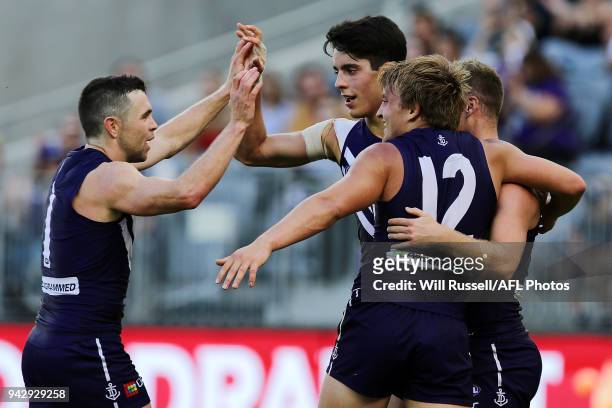 Mitchell Crowden of the Dockers celebrates after scoring a goal during the round three AFL match between the Gold Coast Suns and the Fremantle...