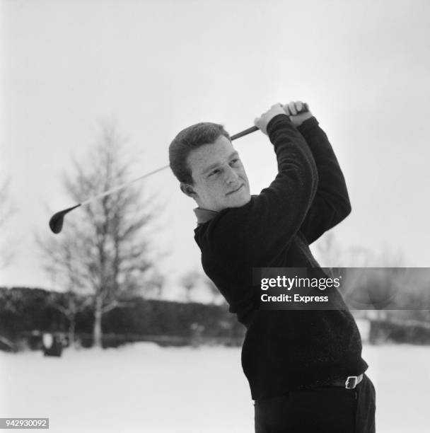 English professional golfer Nick Job in action, UK, 11th January 1968.