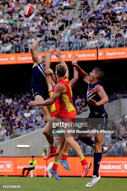 Nat Fyfe of the Dockers spoils during the round three AFL match between the Gold Coast Suns and the Fremantle Dockers at Optus Stadium on April 7,...