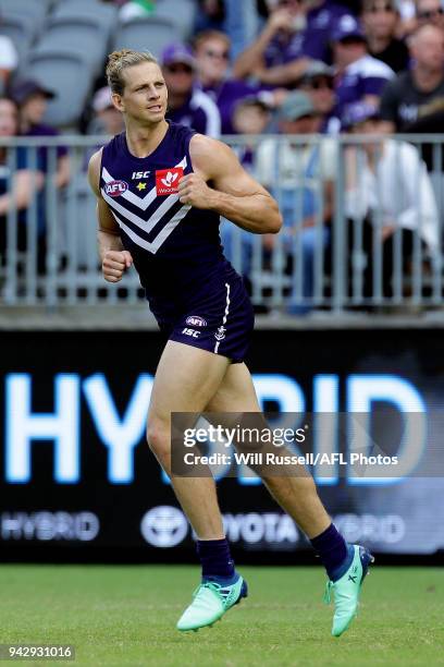 Nat Fyfe of the Dockers celebrates after scoring a goal during the round three AFL match between the Gold Coast Suns and the Fremantle Dockers at...