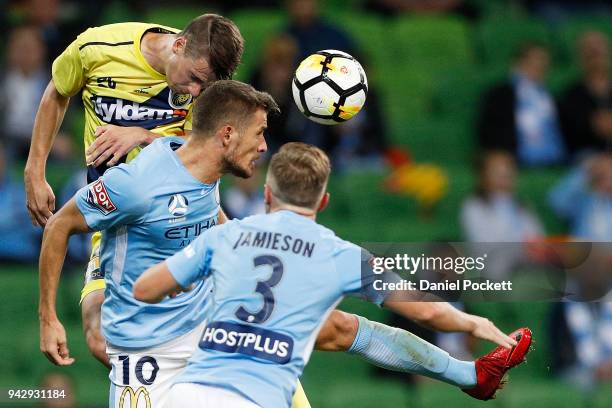 Jake McGing of Central Coast Mariners heads the ball during the round 26 A-League match between Melbourne City and the Central Coast Mariners at AAMI...