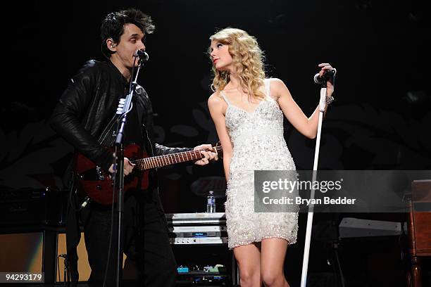 John Mayer and Taylor Swift perform onstage during Z100's Jingle Ball 2009 at Madison Square Garden on December 11, 2009 in New York City.