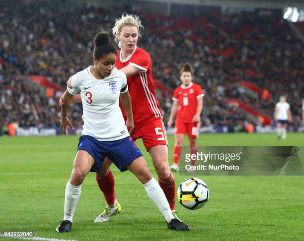 Demi Stokes of England Women under pressure from Rhiannon Roberts of Wales Women during 2019 FIFA Women's World Cup Group 1 qualifier match between...