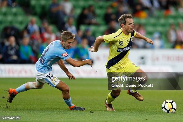 Wout Brama of Central Coast Mariners and Stefan Mauk of Melbourne City contest the ball during the round 26 A-League match between Melbourne City and...