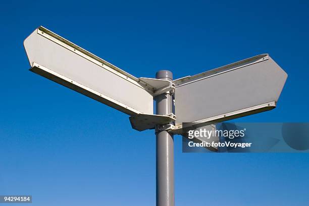 blank sign against a clear blue sky - fotohandy stock pictures, royalty-free photos & images