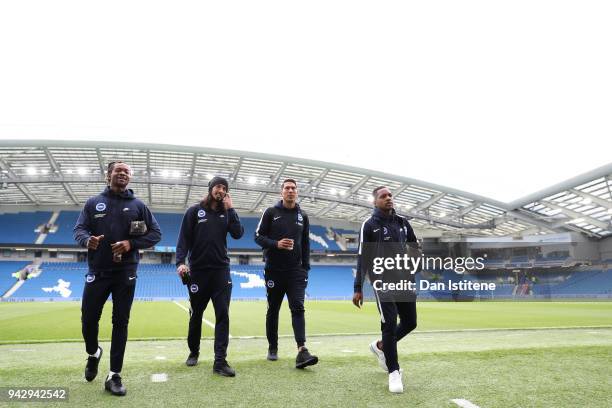 Gaetan Bong of Brighton and Hove Albion, Matias Ezequiel Schelotto of Brighton and Hove Albion, Leonardo Ulloa of Brighton and Hove Albion and Jose...