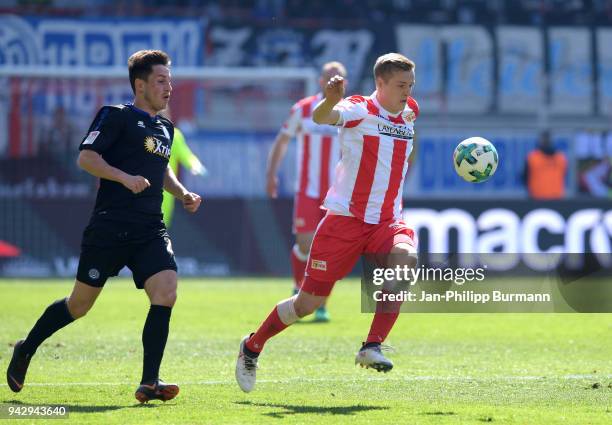 Fabian Schnellhardt of MSV Duisburg and Felix Kroos of 1 FC Union Berlin during the 2nd Bundesliga game between Union Berlin and MSV Duisburg at...