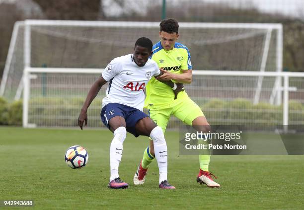 Shilow Tracey of Tottenham Hotspur controls the ball under pressure from Lee Buchanan of Derby County during the Premier League 2 match between...