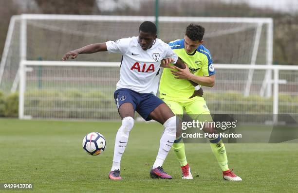 Shilow Tracey of Tottenham Hotspur controls the ball under pressure from Lee Buchanan of Derby County during the Premier League 2 match between...