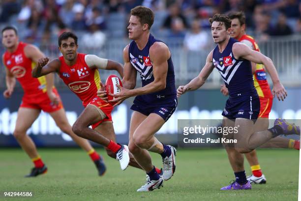 Matt Taberner of the Dockers looks to pass the ball during the round three AFL match between the Gold Coast Suns and the Fremantle Dockers at Optus...
