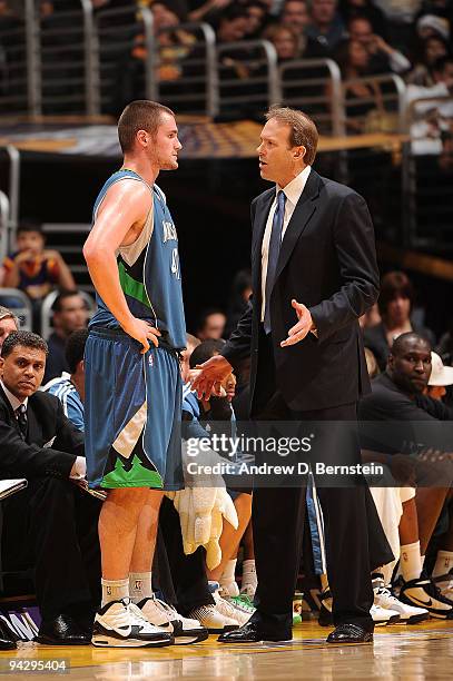 Kevin Love of the Minnesota Timberwolves receives direction from head coach Kurt Rambis during a game against the Los Angeles Lakers at Staples...