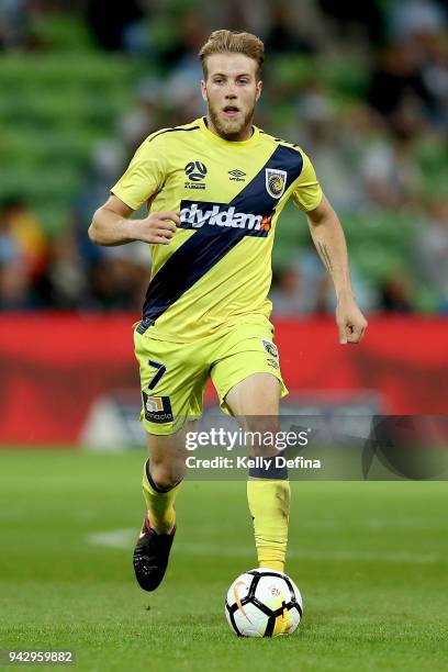 Andrew Hoole of the Mariners runs with the ball during the round 26 A-League match between Melbourne City and the Central Coast Mariners at AAMI Park...