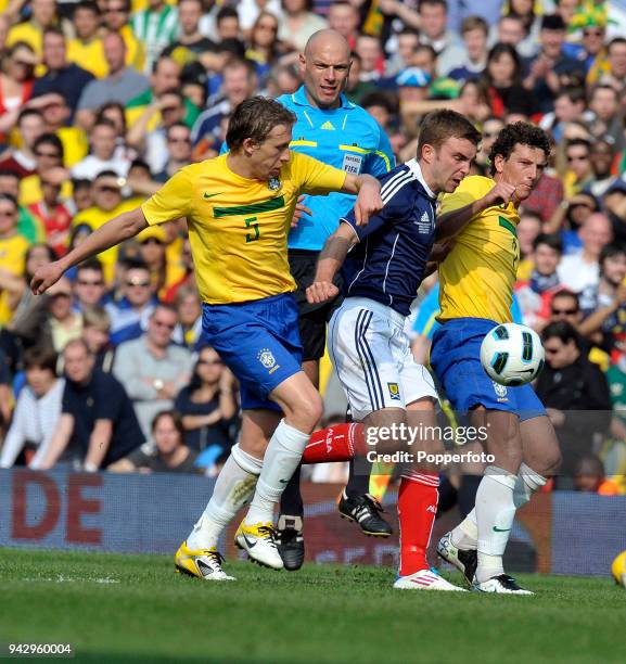James Morrison of Scotland , Lucas Leiva and Elano both of Brazil in action during the International friendly match between Brazil and Scotland at...