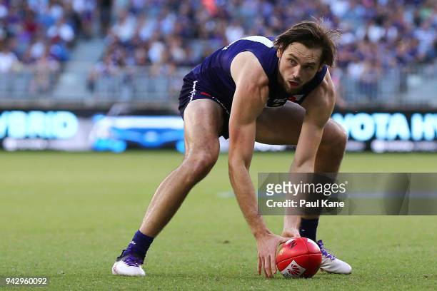 Joel Hamling of the Dockers gathers the ball during the round three AFL match between the Gold Coast Suns and the Fremantle Dockers at Optus Stadium...