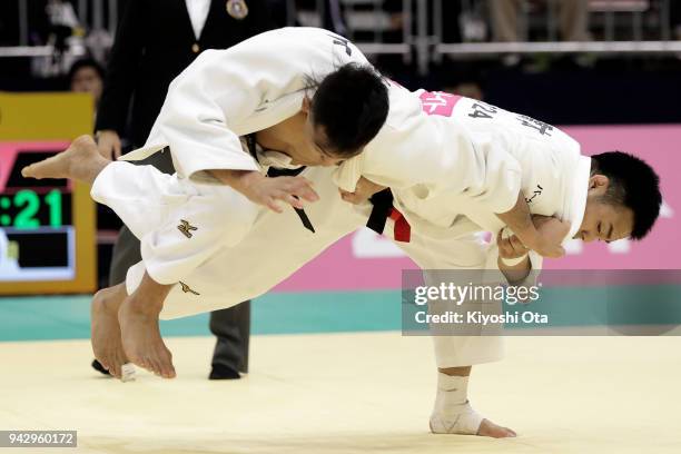 Soichi Hashimoto throws Rentaro Nogami in the Men's -73kg semifinal match on day one of the All Japan Judo Championships by Weight Category at...
