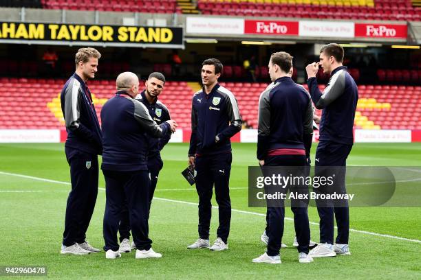 Jack Cork of Burnley and his team mates speak on the pitch prior to the Premier League match between Watford and Burnley at Vicarage Road on April 7,...