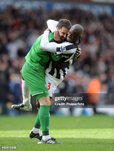 Scott Carson and Abdoulaye Meite of West Bromwich Albion celebrate after the final whistle of the Barclays Premier League match between West Bromwich...