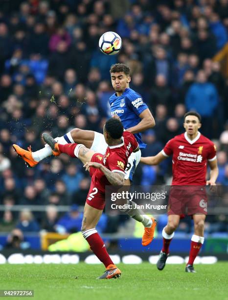 Dominic Calvert-Lewin of Everton is challenged by Nathaniel Clyne of Liverpool during the Premier League match between Everton and Liverpool at...