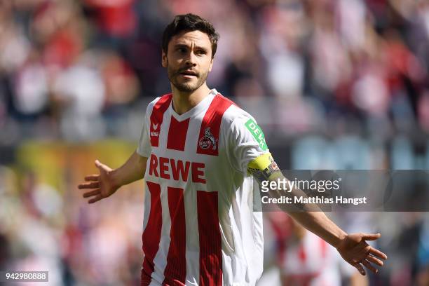 Jonas Hector of Koeln celebrates after he scored a goal to make it 1:0 during the Bundesliga match between 1. FC Koeln and 1. FSV Mainz 05 at...