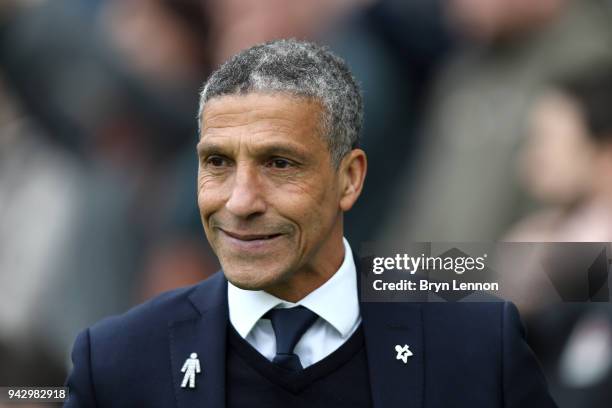 Chris Hughton, Manager of Brighton and Hove Albion looks on prior to the Premier League match between Brighton and Hove Albion and Huddersfield Town...