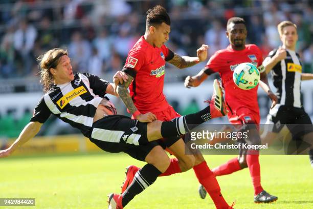 Davie Selkie of Berlin scores the first goal against Jannik Vestergaard of Moenchengladbach during the Bundesliga match between Borussia...