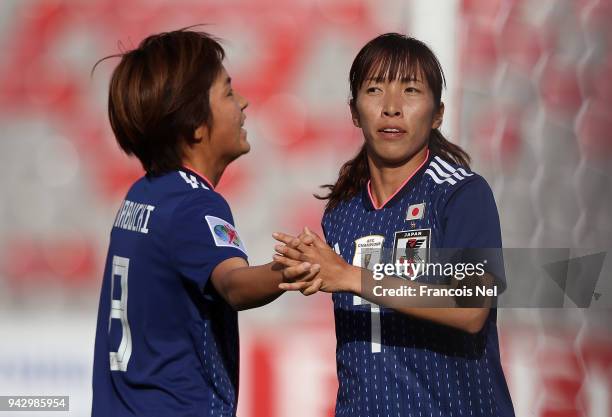 Goalscorer of the second goal for Japan, Emi Nakajima celebrates with Mana Iwabuchi during the AFC Women's Asian Cup Group B match between Japan and...