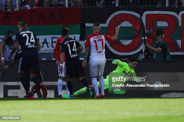 James Rodriguez of Bayern Muenchen scores a goal to m are it 1:2 during the Bundesliga match between FC Augsburg and FC Bayern Muenchen at WWK-Arena...